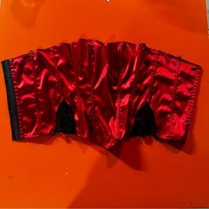 Shiny red corset with black lace